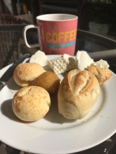Breakfast! Coffee, small baguette, pão de queijo (cheese bread), Coxinha (little chicken yummy), and minas cheese!